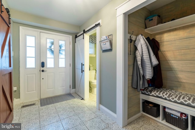 167 Windmill Rd, Willow Grove, PA 19090 - mudroom with a barn door and baseboards