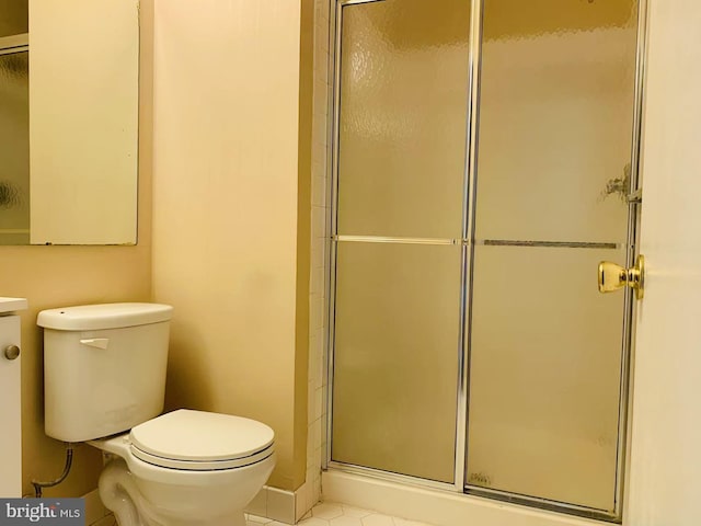 86 Oneill Ct, Trenton, NJ 08648 - full bathroom featuring a shower stall, toilet, tile patterned flooring, and vanity