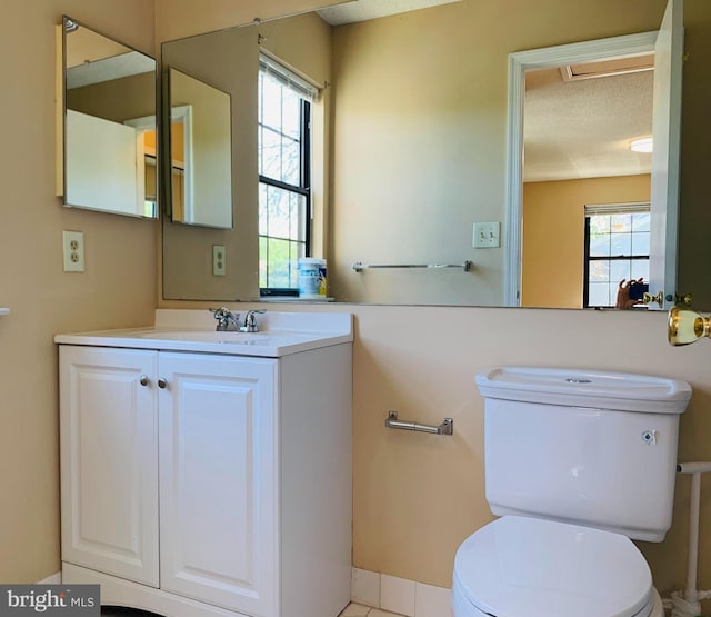 86 Oneill Ct, Trenton, NJ 08648 - bathroom featuring toilet, vanity, and a textured ceiling