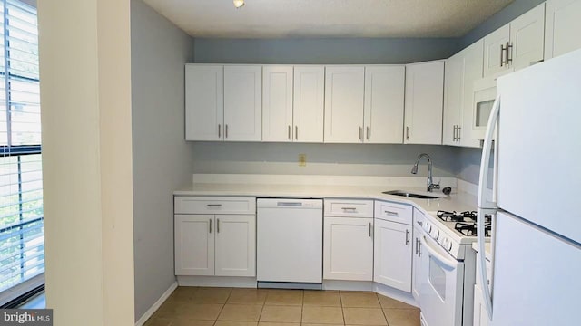 86 Oneill Ct, Trenton, NJ 08648 - kitchen featuring white appliances, a sink, plenty of natural light, and light tile patterned flooring