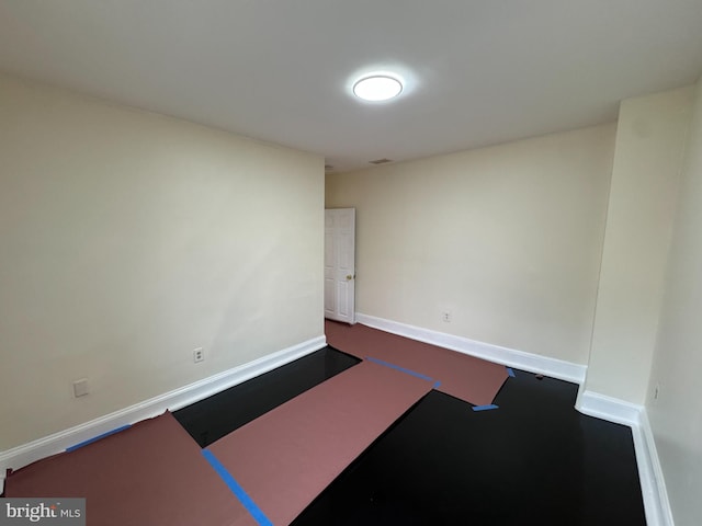2411 N W St, Wilmington, DE 19802 - spare room featuring baseboards