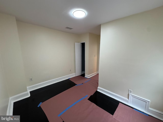 2411 N W St, Wilmington, DE 19802 - empty room with baseboards and wood finished floors