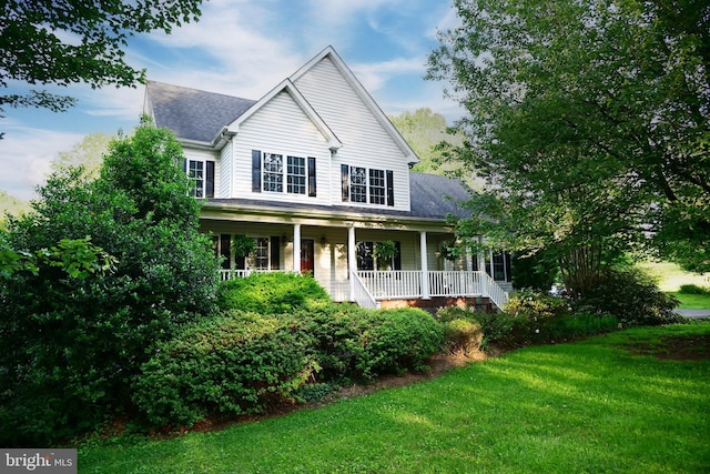 7209 Fox Trl, Warrenton, VA 20186 - view of front of home featuring covered porch, a front lawn, and a shingled roof