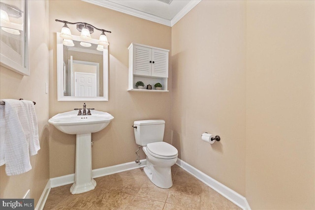 25 Ginnie Ln, West Windsor, NJ 08550 - bathroom with crown molding, toilet, baseboards, a sink, and tile patterned floors