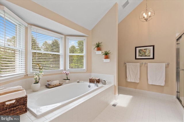 25 Ginnie Ln, West Windsor, NJ 08550 - bathroom featuring plenty of natural light, vaulted ceiling, a bath, tile patterned flooring, and a shower with shower door