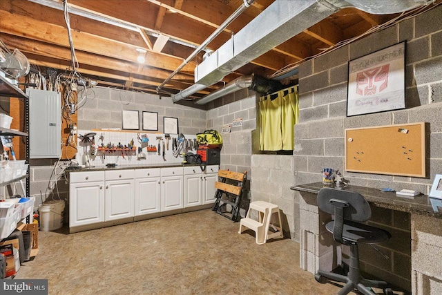 25 Ginnie Ln, West Windsor, NJ 08550 - unfinished below grade area with a workshop area, electric panel, and concrete block wall