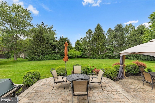 25 Ginnie Ln, West Windsor, NJ 08550 - view of patio / terrace featuring outdoor dining area and view of scattered trees