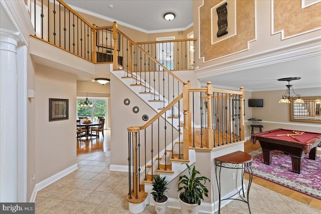 25 Ginnie Ln, West Windsor, NJ 08550 - stairway featuring a chandelier, a towering ceiling, crown molding, billiards table, and baseboards