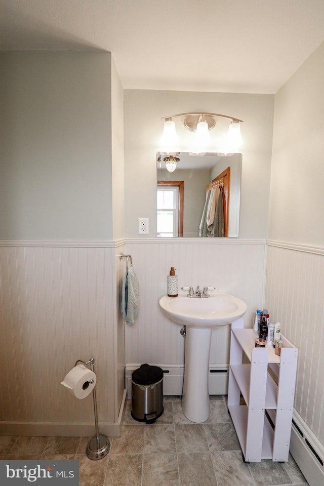 72 Springs Ave, Gettysburg, PA 17325 - bathroom featuring a baseboard heating unit and wainscoting