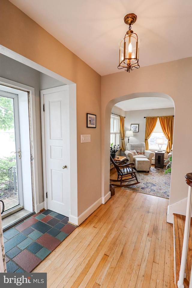 72 Springs Ave, Gettysburg, PA 17325 - foyer featuring arched walkways, wood-type flooring, healthy amount of natural light, and baseboards