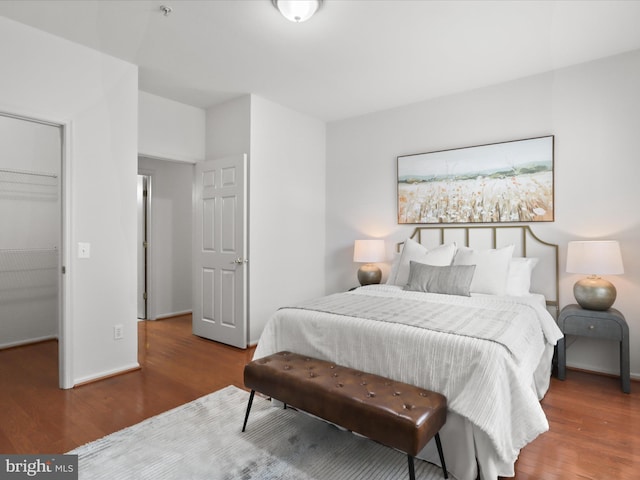 1521 Spring Gate Dr Unit 10308, Mclean, VA 22102 - bedroom with wood finished floors and baseboards