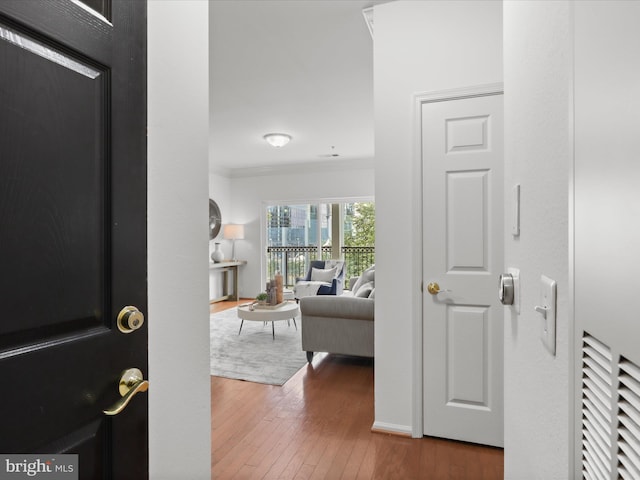 1521 Spring Gate Dr Unit 10308, Mclean, VA 22102 - foyer entrance with hardwood / wood-style floors and ornamental molding