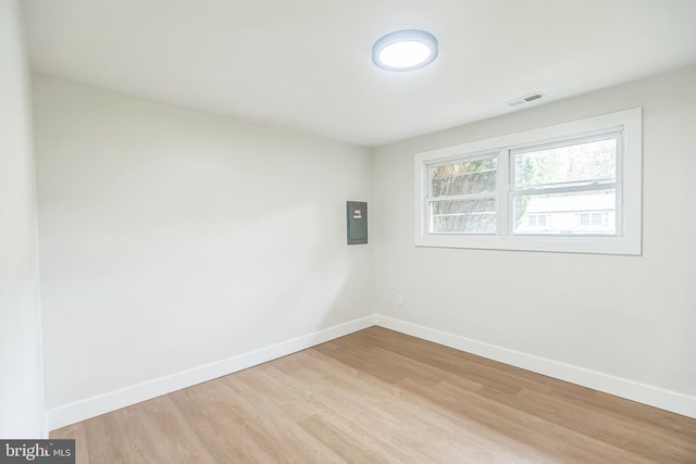 4 Donna Marie Ct, Sicklerville, NJ 08081 - spare room with light wood-type flooring, baseboards, and electric panel