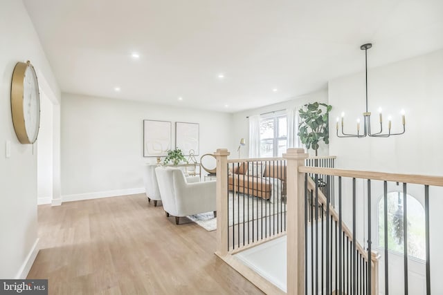 4 Donna Marie Ct, Sicklerville, NJ 08081 - hall with an upstairs landing, a chandelier, wood finished floors, baseboards, and recessed lighting