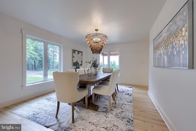 2655 Gap Newport Pike, West Grove, PA 19390 - dining space with a chandelier, light wood finished floors, and baseboards