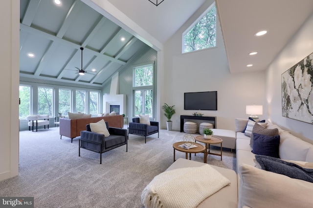 2655 Gap Newport Pike, West Grove, PA 19390 - carpeted living area with high vaulted ceiling, a ceiling fan, recessed lighting, beamed ceiling, and a glass covered fireplace