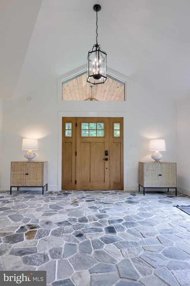 2655 Gap Newport Pike, West Grove, PA 19390 - foyer entrance featuring stone flooring, high vaulted ceiling, and baseboards