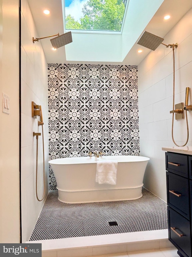 2655 Gap Newport Pike, West Grove, PA 19390 - bathroom featuring tile walls, a tile shower, a freestanding bath, vanity, and recessed lighting