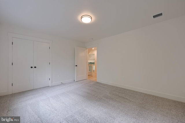2655 Gap Newport Pike, West Grove, PA 19390 - unfurnished bedroom featuring light colored carpet, baseboards, and a closet