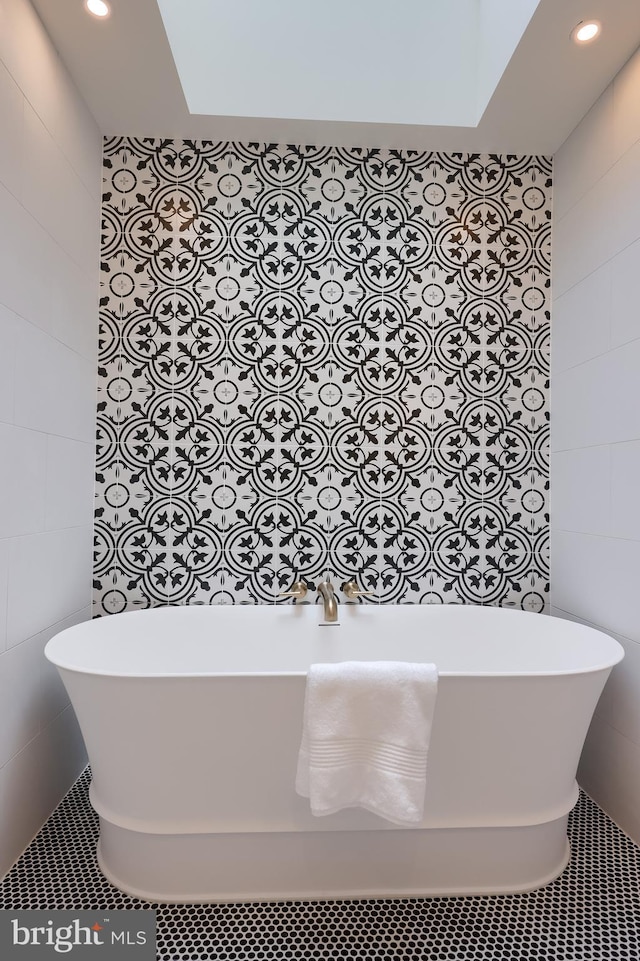 2655 Gap Newport Pike, West Grove, PA 19390 - bathroom with tile walls, a soaking tub, recessed lighting, and tile patterned flooring