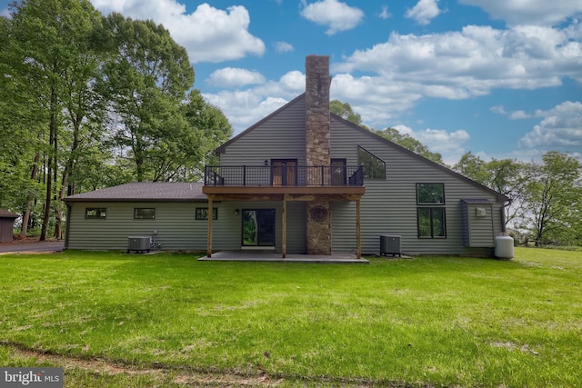 2655 Gap Newport Pike, West Grove, PA 19390 - back of house with central air condition unit, a wooden deck, a lawn, and a patio area