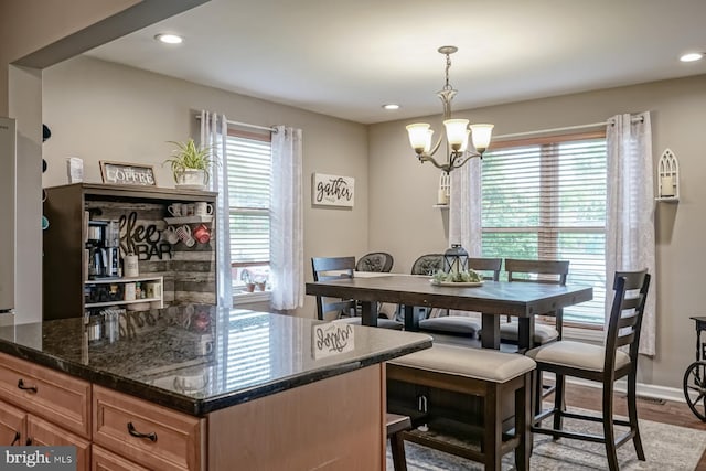 666 Bridgeton Park, Mantua, NJ 08051 - dining room featuring a chandelier, wood finished floors, recessed lighting, and baseboards