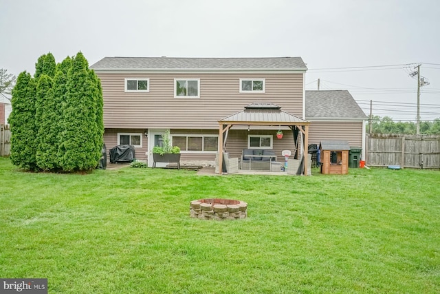 666 Bridgeton Park, Mantua, NJ 08051 - rear view of property with a gazebo, an outdoor living space with a fire pit, a patio area, and roof with shingles