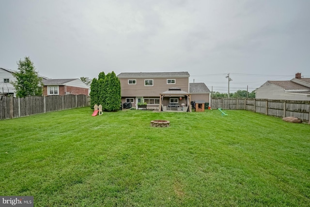666 Bridgeton Park, Mantua, NJ 08051 - rear view of property with a gazebo, a fire pit, and a patio area