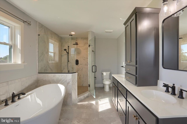 104 Lightfoot Ln, Dillsburg, PA 17019 - full bathroom featuring a stall shower, double vanity, a soaking tub, toilet, and marble finish floors