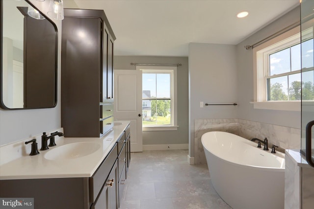 104 Lightfoot Ln, Dillsburg, PA 17019 - bathroom featuring plenty of natural light, a freestanding bath, vanity, recessed lighting, and tile patterned flooring