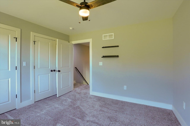104 Lightfoot Ln, Dillsburg, PA 17019 - unfurnished bedroom with carpet flooring, baseboards, ceiling fan, and a closet
