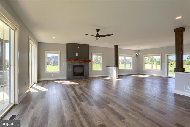 104 Lightfoot Ln, Dillsburg, PA 17019 - unfurnished living room with a fireplace, baseboards, a chandelier, dark wood-style floors, and recessed lighting
