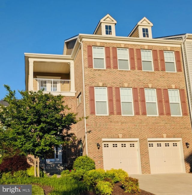 22270 Foggy Ridge Ter, Ashburn, VA 20148 - view of front of house with a garage, driveway, and brick siding