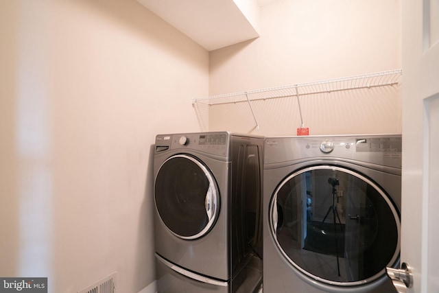 22270 Foggy Ridge Ter, Ashburn, VA 20148 - washroom with washing machine and clothes dryer