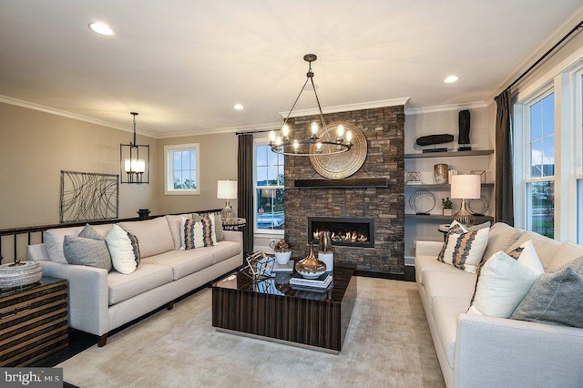 22270 Foggy Ridge Ter, Ashburn, VA 20148 - living room featuring a chandelier, crown molding, a stone fireplace, and recessed lighting