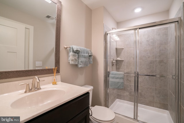 22270 Foggy Ridge Ter, Ashburn, VA 20148 - bathroom featuring toilet, vanity, a stall shower, and recessed lighting