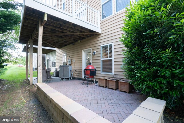 22270 Foggy Ridge Ter, Ashburn, VA 20148 - view of patio featuring cooling unit and a grill