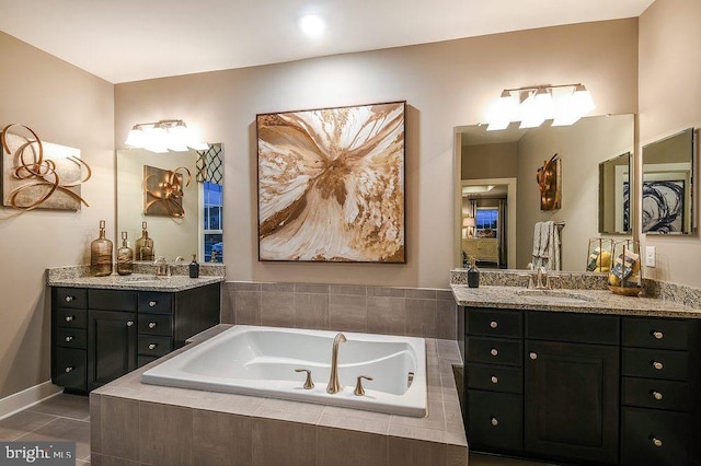 22270 Foggy Ridge Ter, Ashburn, VA 20148 - bathroom featuring a bath, two vanities, and tile patterned flooring