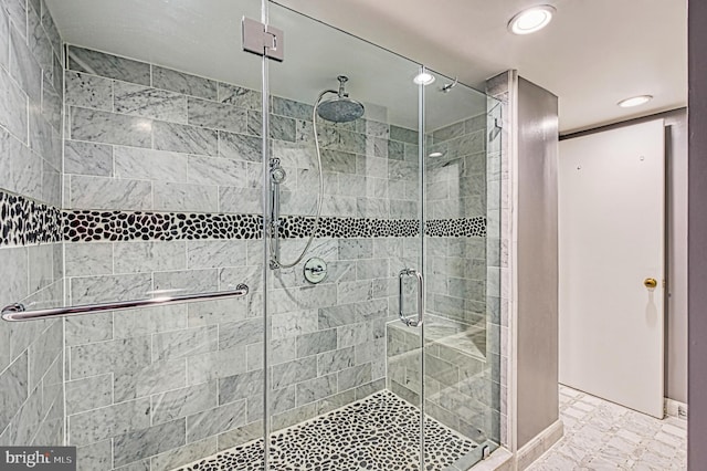 1101 S Arlington Ridge Rd Unit 216, Arlington, VA 22202 - bathroom featuring a stall shower, recessed lighting, and marble finish flooring