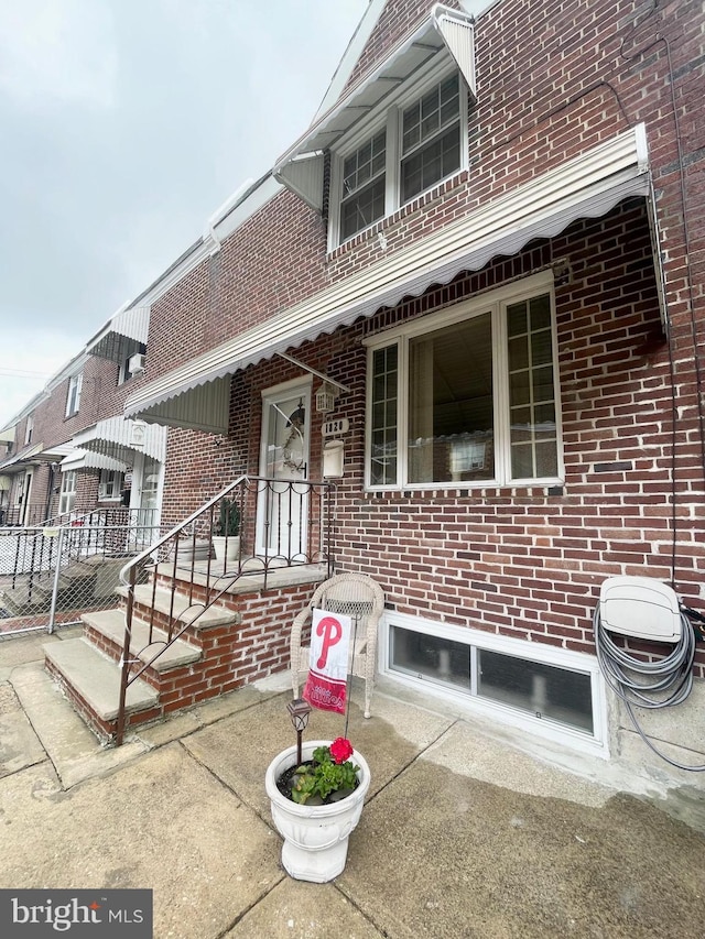 1820 S Dover St, Philadelphia, PA 19145 - view of front of home with brick siding