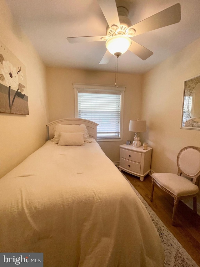 1820 S Dover St, Philadelphia, PA 19145 - bedroom with wood finished floors, multiple windows, and a ceiling fan