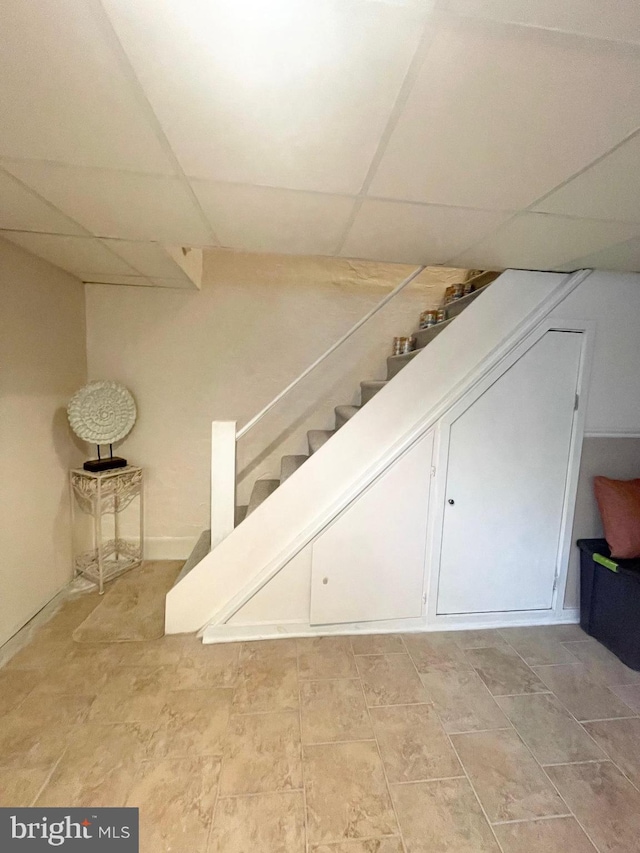 1820 S Dover St, Philadelphia, PA 19145 - finished below grade area featuring a paneled ceiling and stairway