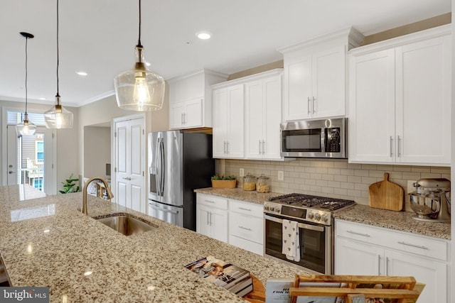 45210 Lettermore Sq, Sterling, VA 20166 - kitchen with appliances with stainless steel finishes, a sink, white cabinetry, crown molding, and recessed lighting