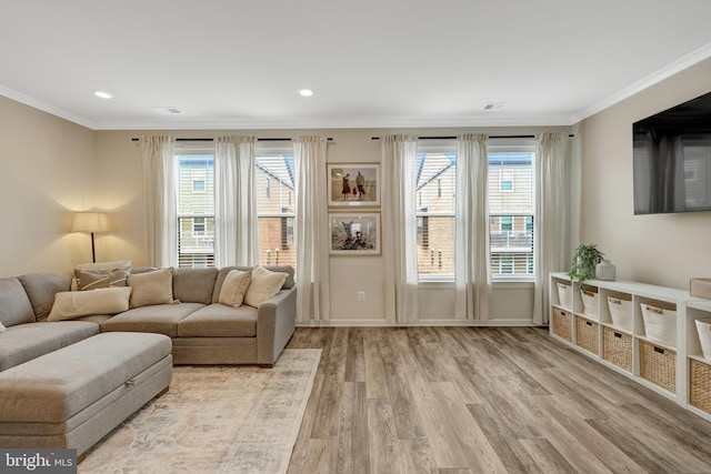 45210 Lettermore Sq, Sterling, VA 20166 - living area with crown molding, light wood finished floors, recessed lighting, and baseboards