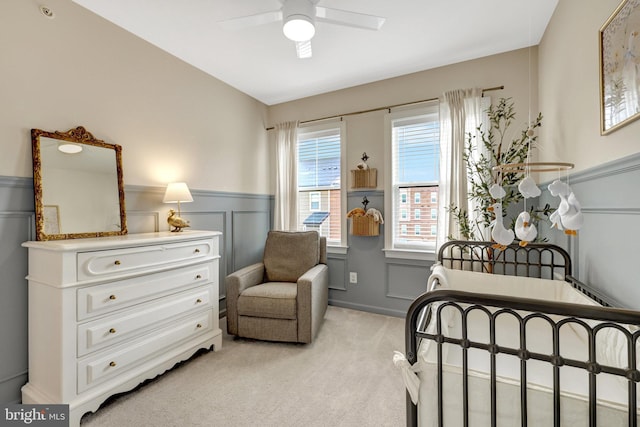 45210 Lettermore Sq, Sterling, VA 20166 - bedroom featuring light carpet, a wainscoted wall, and a ceiling fan