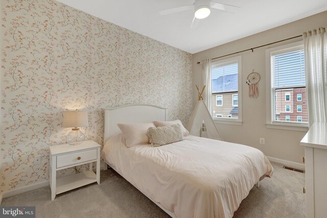 45210 Lettermore Sq, Sterling, VA 20166 - carpeted bedroom with baseboards, wallpapered walls, and a ceiling fan