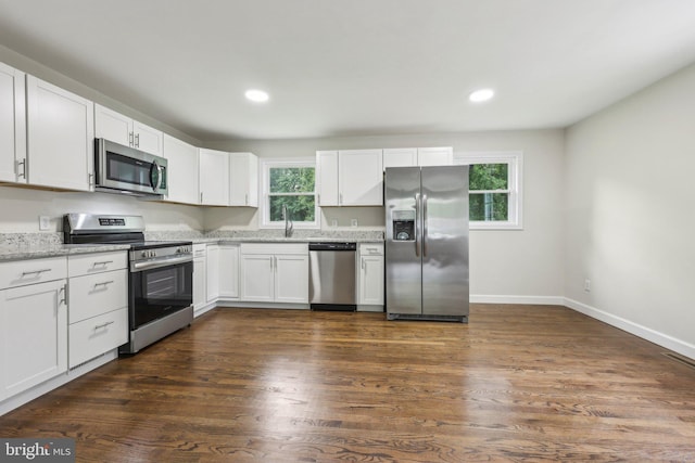 945 Ficklen Rd, Fredericksburg, VA 22405 - kitchen with appliances with stainless steel finishes, healthy amount of natural light, white cabinetry, a sink, and recessed lighting