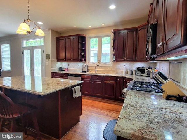 21785 Watson Rd, Leesburg, VA 20175 - kitchen featuring open shelves, a sink, healthy amount of natural light, recessed lighting, and pendant lighting