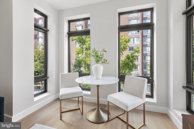 1208 M St NW Unit 52, Washington, DC 20005 - dining area featuring light wood-style flooring and baseboards