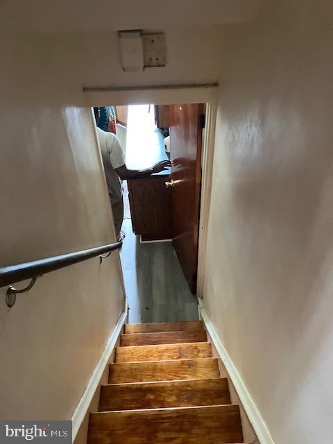 1214 Haworth St, Philadelphia, PA 19124 - staircase featuring wood finished floors